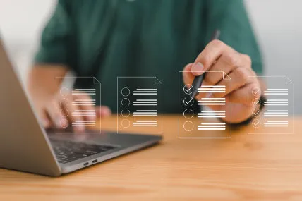 Tech image showing a man making a selection on a virtual screen.
